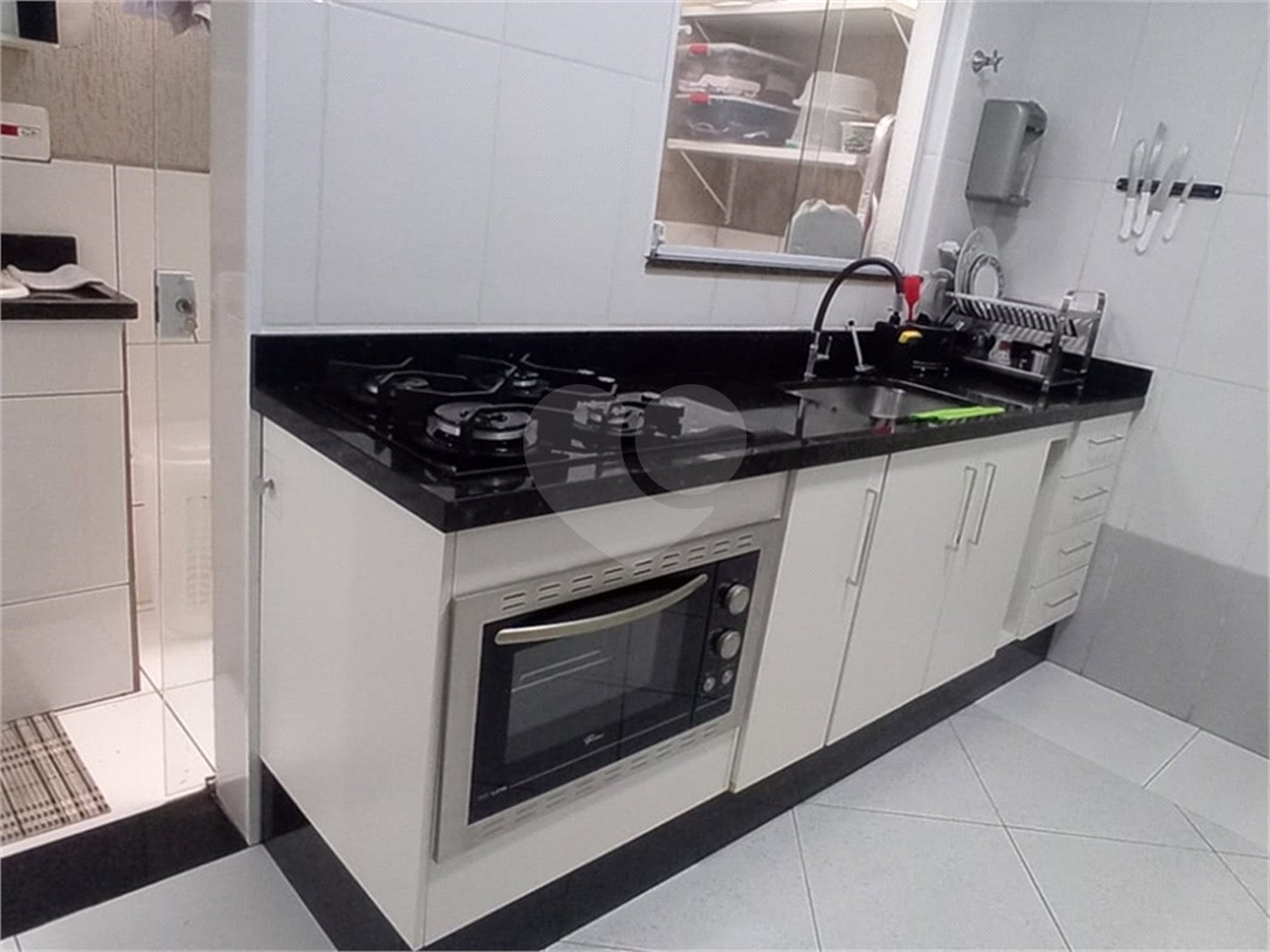 Casa à venda com 2 suítes no condomínio Residencial Pavoni I, São Paulo - SP