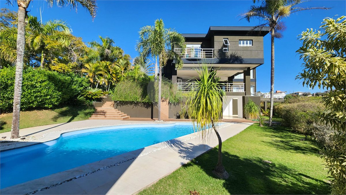 Casa à venda ou para alugar com 5 suítes no condomínio Residencial Jardim Primavera, Louveira - SP