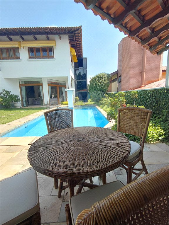 Casa à venda com 4 suítes no condomínio Ville Bourghese, São Paulo - SP