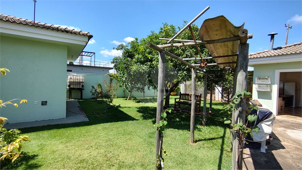 Casa à venda com 4 suítes no condomínio Parque Chapada de Itu, Itu - SP