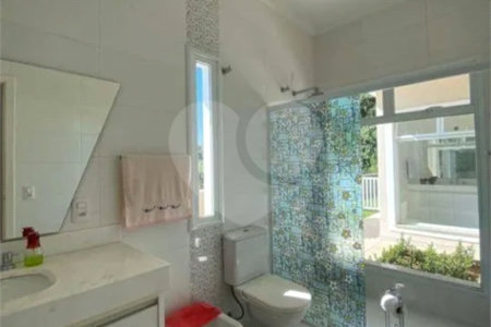 Casa à venda com 4 suítes no condomínio Ipê Velho, Vinhedo - SP