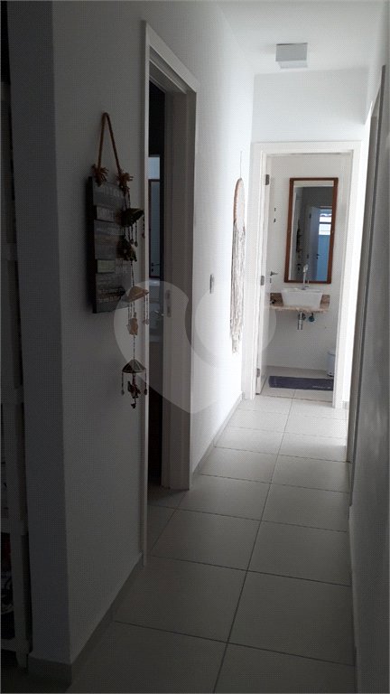 Casa à venda com 4 quartos, sendo 3 suítes, no condomínio Residencial Vila Esmeralda, São Sebastião - SP