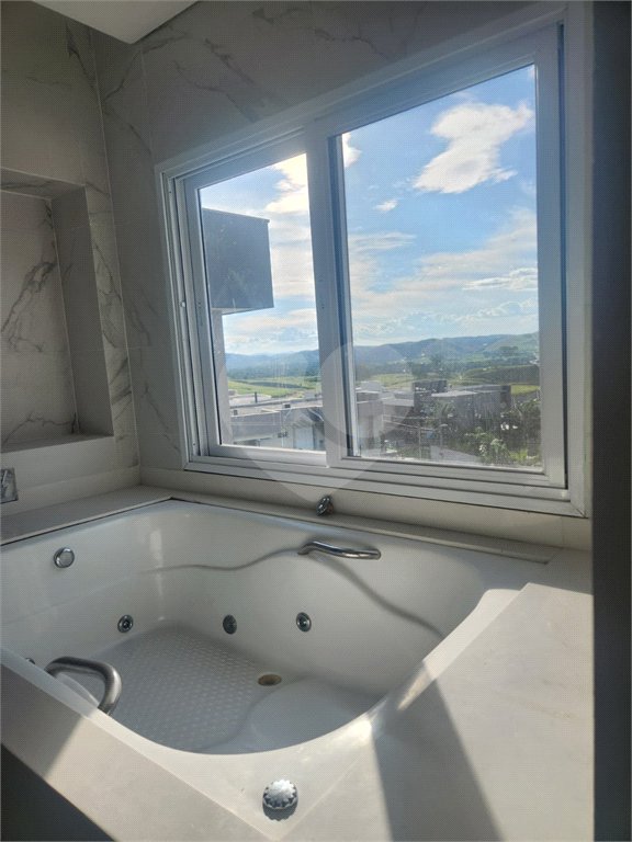Casa à venda ou para alugar com 4 suítes no condomínio Residencial Jaguary, São José dos Campos - SP