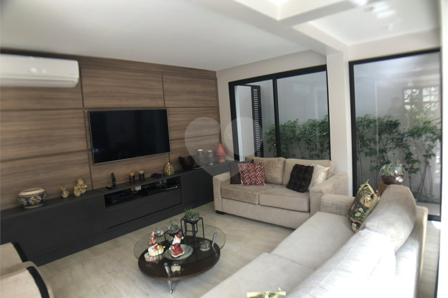 Casa à venda com 4 suítes no condomínio Residencial Floresta, São Paulo - SP
