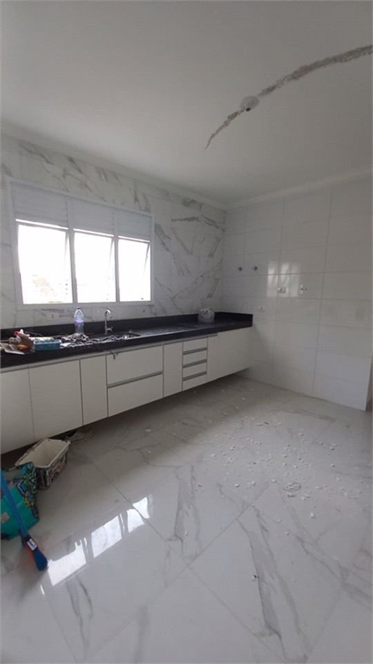 Casa com 3 dormitórios à venda, 136 m² por R$ 970.000,00 - Ponta da Praia - Santos/SP