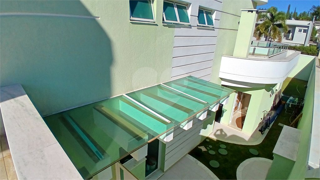 Casa à venda com 3 suítes no condomínio Figueira Garden, Atibaia - SP