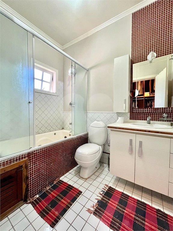 Casa à venda com 5 quartos, sendo 3 suítes, no condomínio Santa Teresa 1, Vinhedo - SP