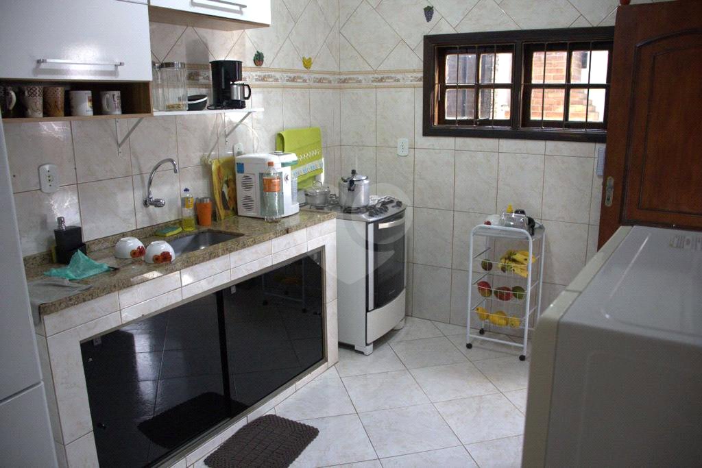 Casa à venda com 3 quartos, sendo 1 suíte, no condomínio Village da Posse, Rio de Janeiro - RJ