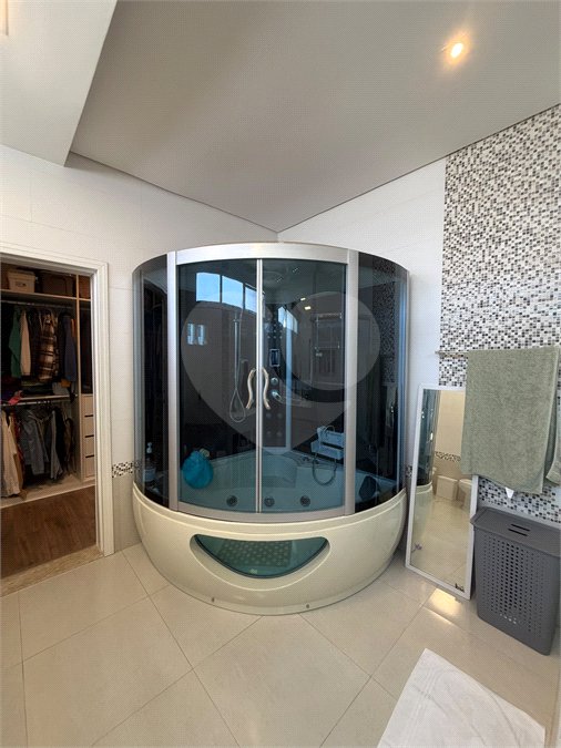 Casa à venda com 4 suítes no condomínio Jardim das Palmeiras, Vinhedo - SP