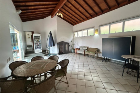 Casa à venda com 5 suítes no condomínio Residencial Bougainville, Campinas - SP