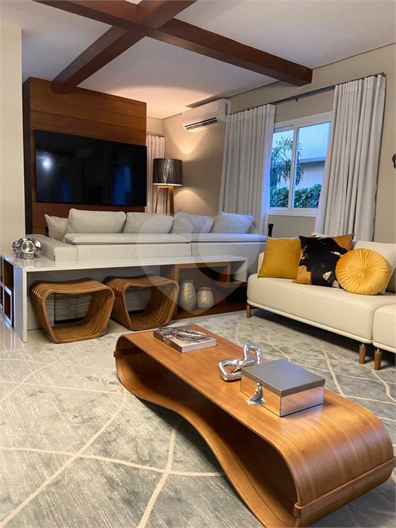 Casa à venda com 4 suítes no condomínio Marambaia, Vinhedo - SP