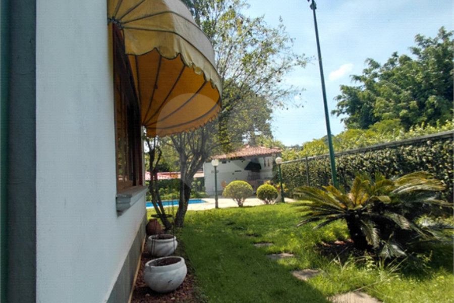 Casa à venda com 4 suítes no condomínio Ville Bourghese, São Paulo - SP
