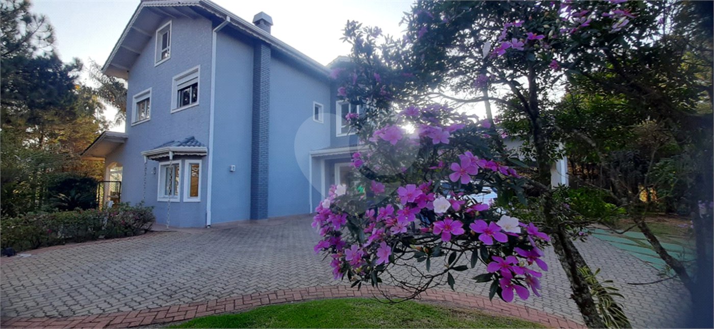 Casa à venda com 4 suítes no condomínio Suíça da Cantareira, Mairiporã - SP