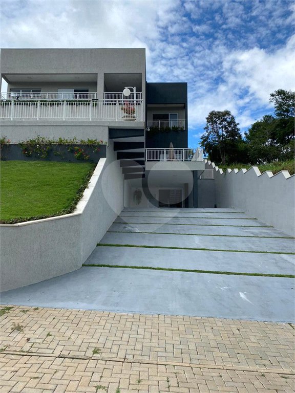 Casa à venda com 4 suítes no condomínio Reserva Ibirapitanga Ii, Santa Isabel - SP