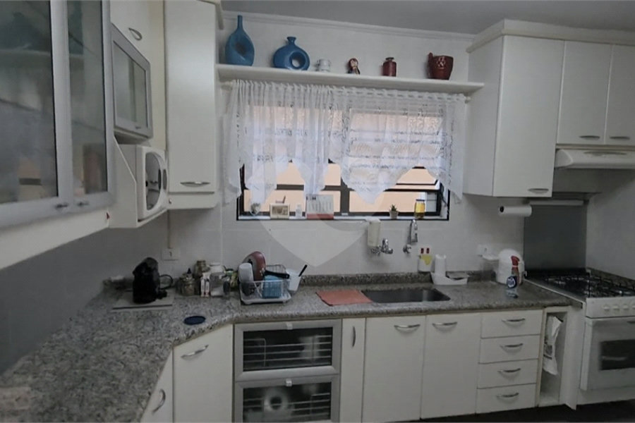 Casa à venda com 4 quartos, sendo 1 suíte, em Parada Inglesa, São Paulo, SP