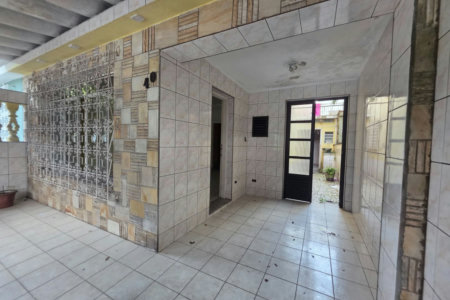 Sobrado com 3 dormitórios à venda, 129 m² por R$ 638.000,00 - Encruzilhada - Santos/SP
