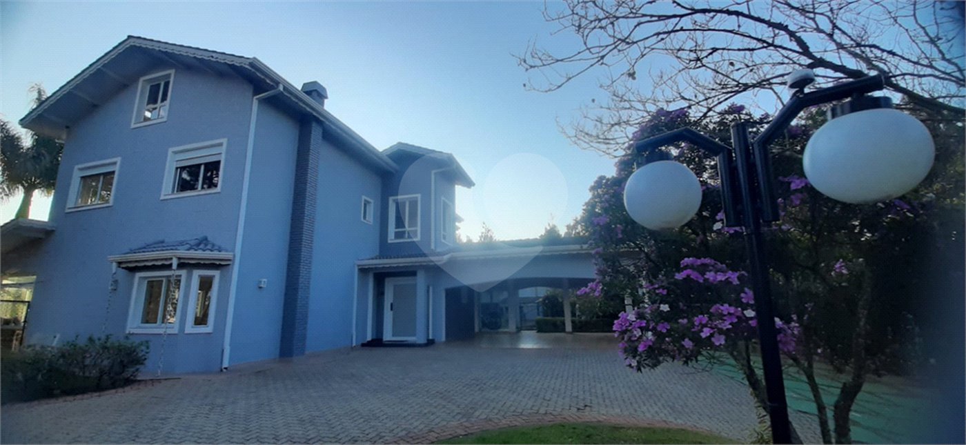 Casa à venda com 4 suítes no condomínio Suíça da Cantareira, Mairiporã - SP