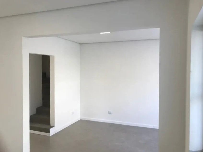 Casa com 3 dormitórios à venda, 116 m² por R$ 690.000,00 - Gonzaga - Santos/SP