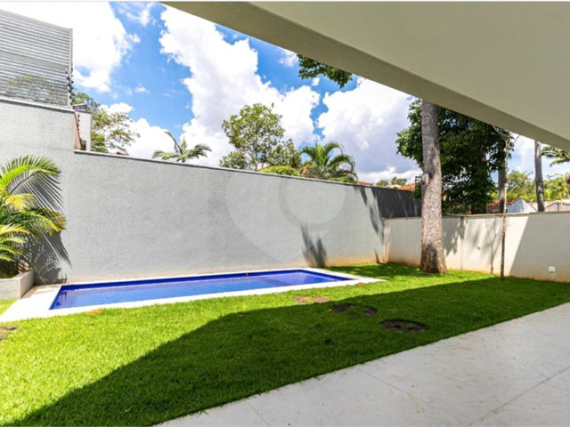 Casa à venda com 4 suítes no condomínio Hípica Garden, São Paulo - SP