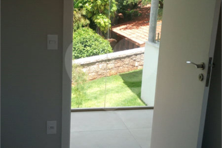 Casa à venda com 4 suítes no condomínio Estância Marambaia, Vinhedo - SP