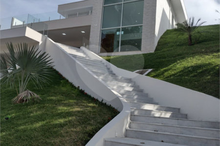 Casa à venda com 4 suítes no condomínio Estância Marambaia, Vinhedo - SP