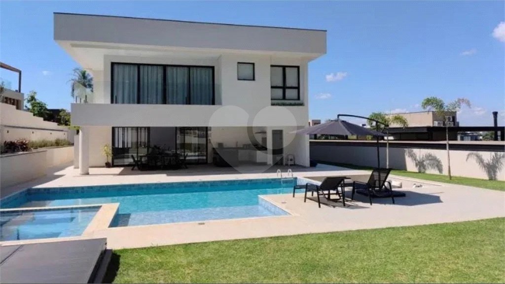 Casa à venda com 4 suítes no condomínio Fazenda Serra Azul, Itupeva - SP