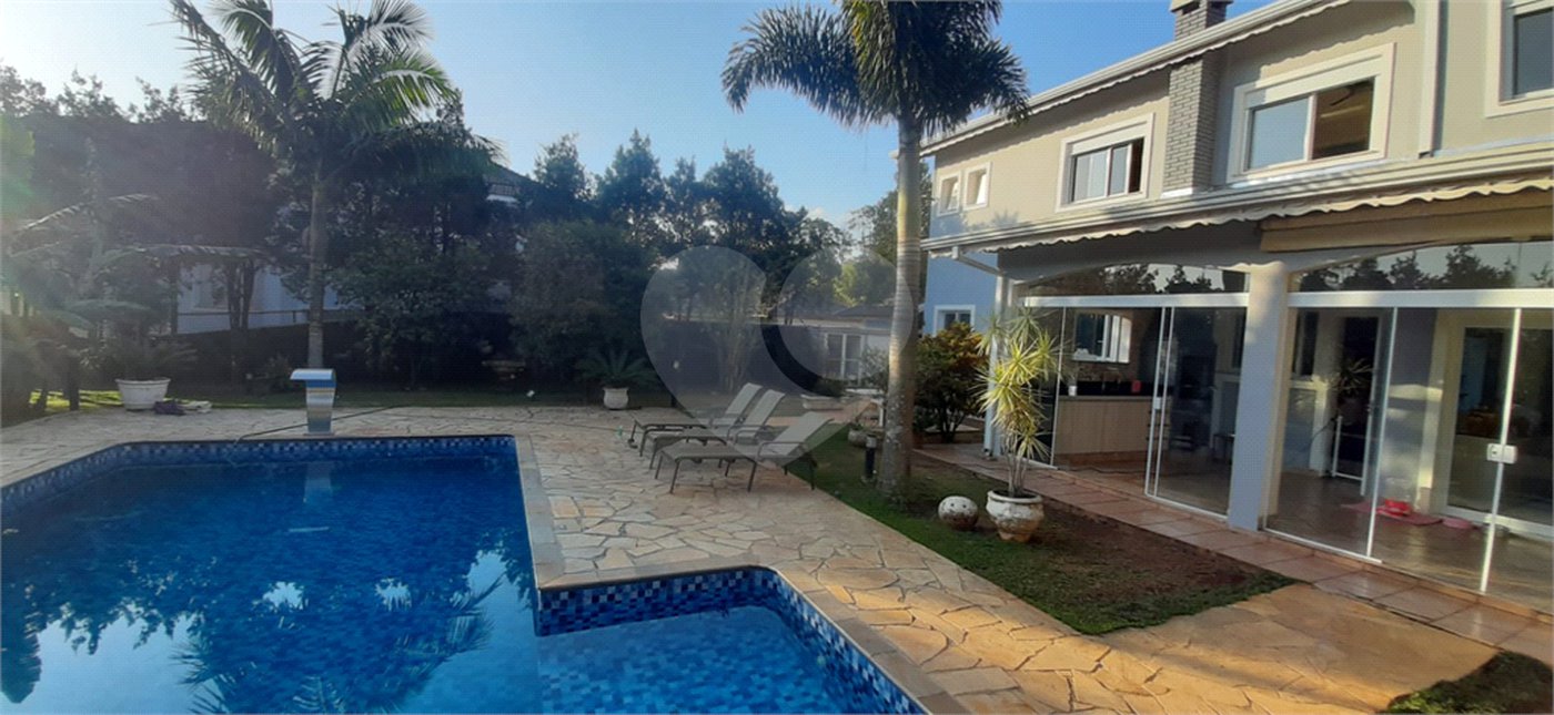 Casa à venda com 4 suítes no condomínio Suíça da Cantareira, Mairiporã - SP