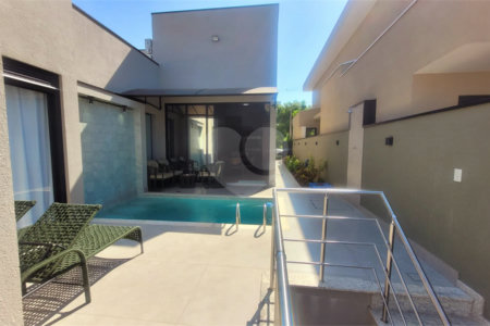 Casa à venda com 4 suítes no condomínio Sta Morriz, Campinas - SP