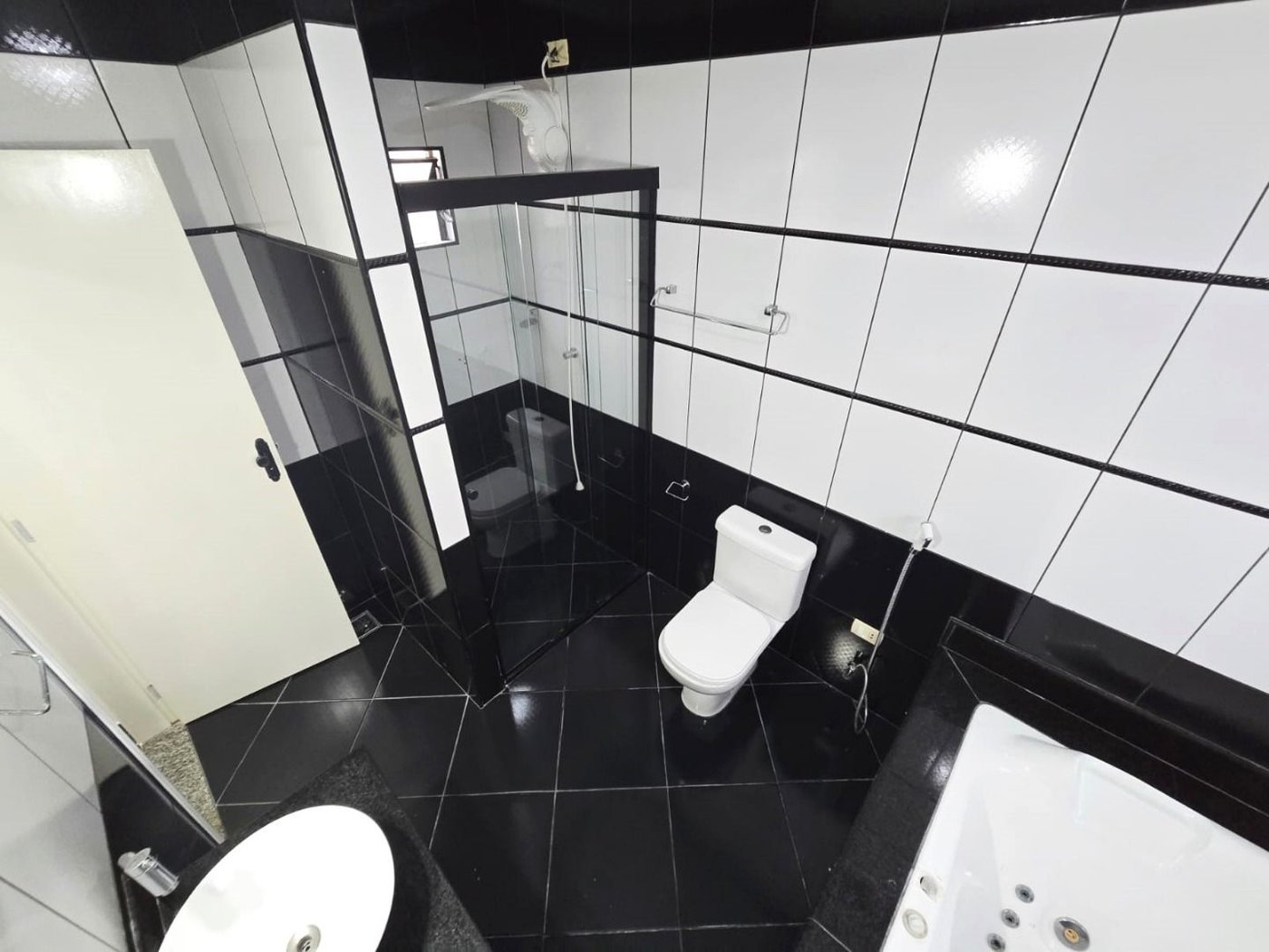 Casa com 3 dormitórios à venda, 150 m² por R$ 960.000,00 - Macuco - Santos/SP