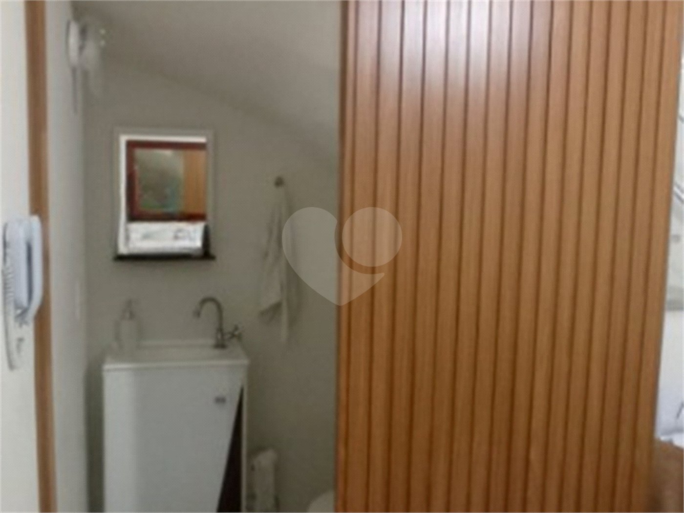 Casa à venda com 2 suítes no condomínio Residencial Pavoni I, São Paulo - SP