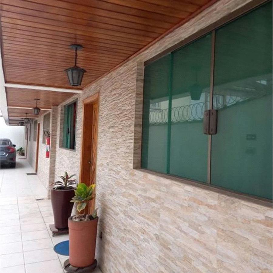 Casa com 2 dormitórios para alugar, 100 m² por R$ 5.000,00 - Macuco - Santos/SP