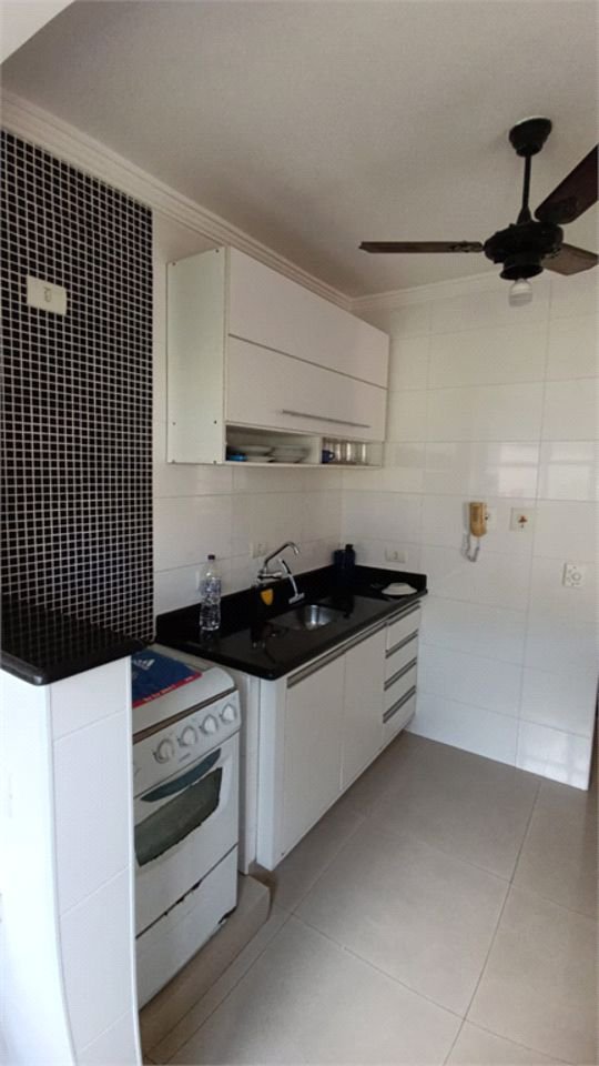 Apartamento com 2 dormitórios à venda, 60 m² por R$ 330.000,00 - Jardim São Miguel - Guarujá/SP