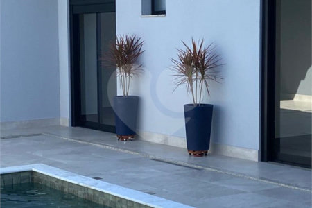 Casa à venda com 3 suítes no condomínio Residencial Maria Dulce, Indaiatuba - SP