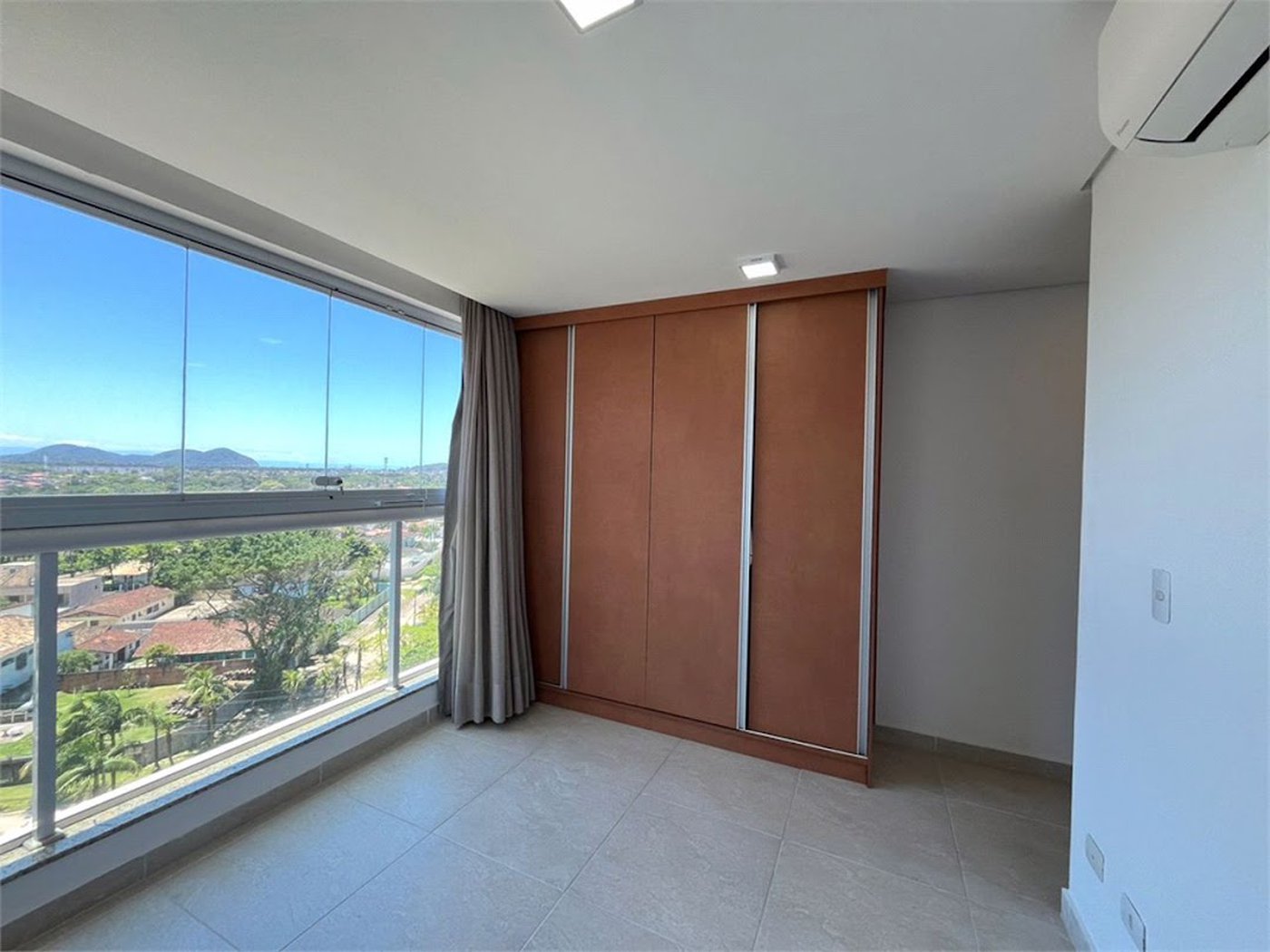 Apartamento com 2 dormitórios à venda, 69 m² por R$ 670.000,00 - Jardim Virgínia - Guarujá/SP