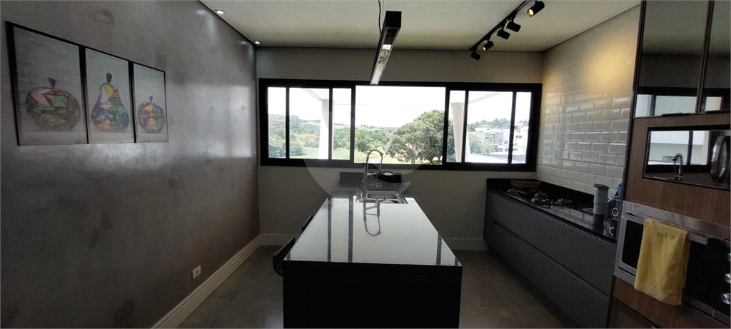 Casa à venda ou para alugar com 4 suítes no condomínio Figueira Garden, Atibaia - SP
