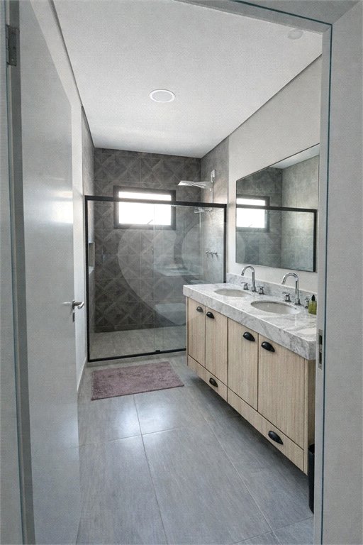 Casa à venda com 4 suítes no condomínio Figueira Garden, Atibaia - SP