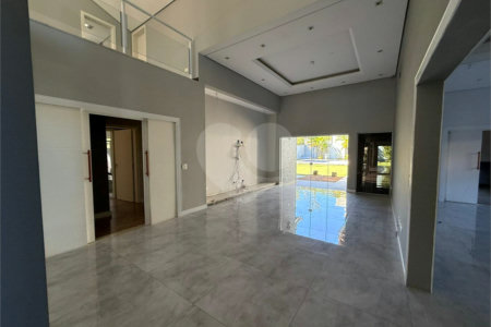 Casa alto padrão condomínio fechado em Atibaia com 4 suítes e ampla área de lazer, espaço gourmet, piscina, 6 vagas garagem