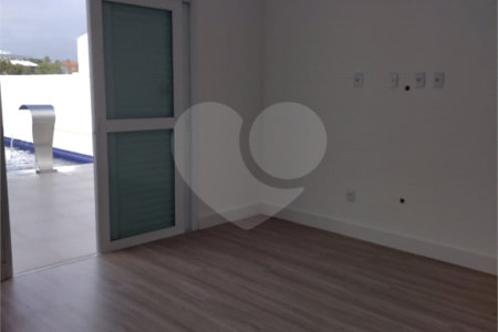 Casa à venda com 4 suítes no condomínio Estância Marambaia, Vinhedo - SP