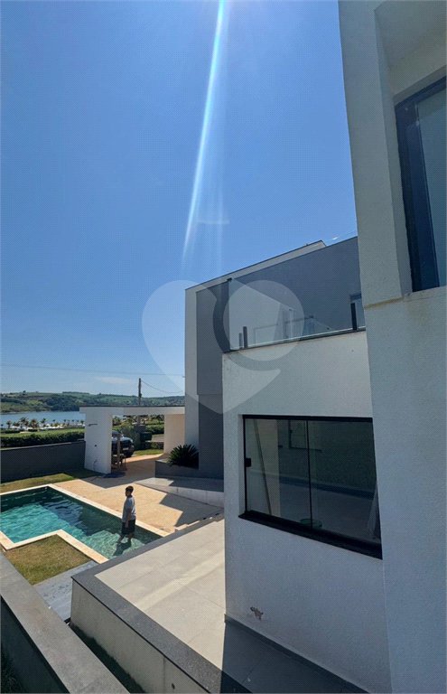 Casa à venda com 5 suítes no condomínio Riviera Santa Cristina Iii, Itaí - SP