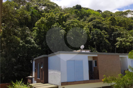 Casa à venda ou para alugar com 4 suítes no condomínio Sambaqui, São Sebastião - SP