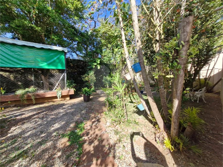 Casa à venda com 4 suítes no condomínio Villa Viana II, Cotia - SP