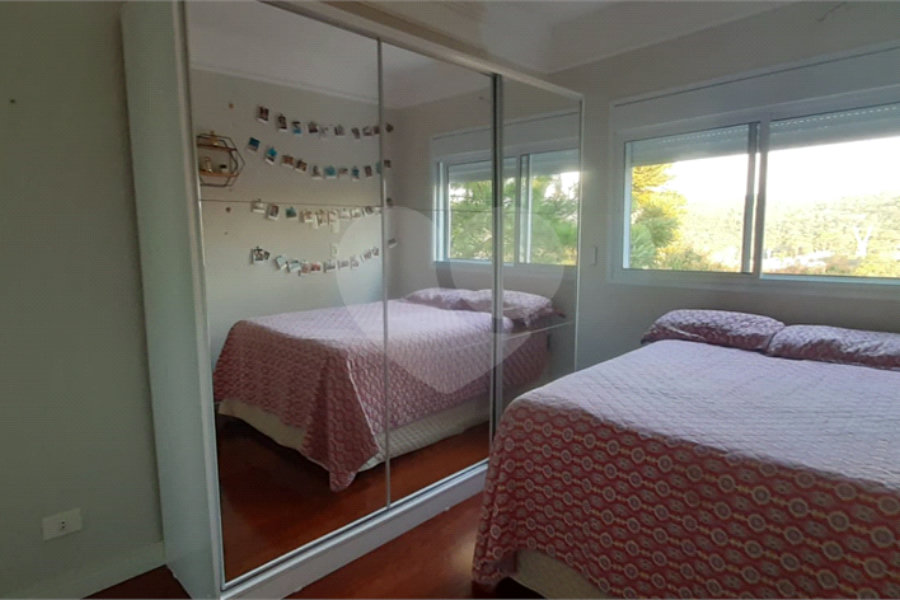 Casa à venda com 4 suítes no condomínio Suíça da Cantareira, Mairiporã - SP