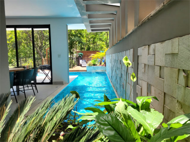 Casa à venda com 4 suítes no condomínio Jardim Itatinga, São Paulo - SP