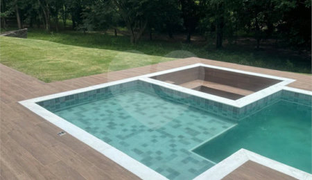 Casa à venda com 4 suítes no condomínio Figueira Garden, Atibaia - SP