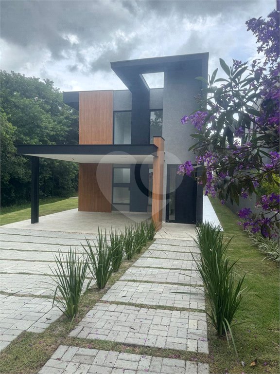 Casa à venda com 4 suítes no condomínio Figueira Garden, Atibaia - SP
