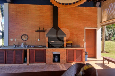 Casa à venda com 4 suítes no condomínio Residencial Vale das Laranjeiras, Indaiatuba - SP