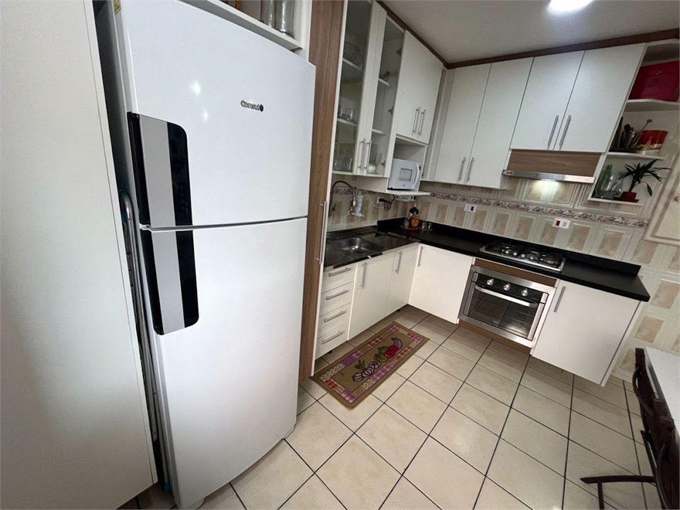 Apartamento com 2 dormitórios à venda, 64 m² por R$ 360.000,00 - Jardim Praiano - Guarujá/SP