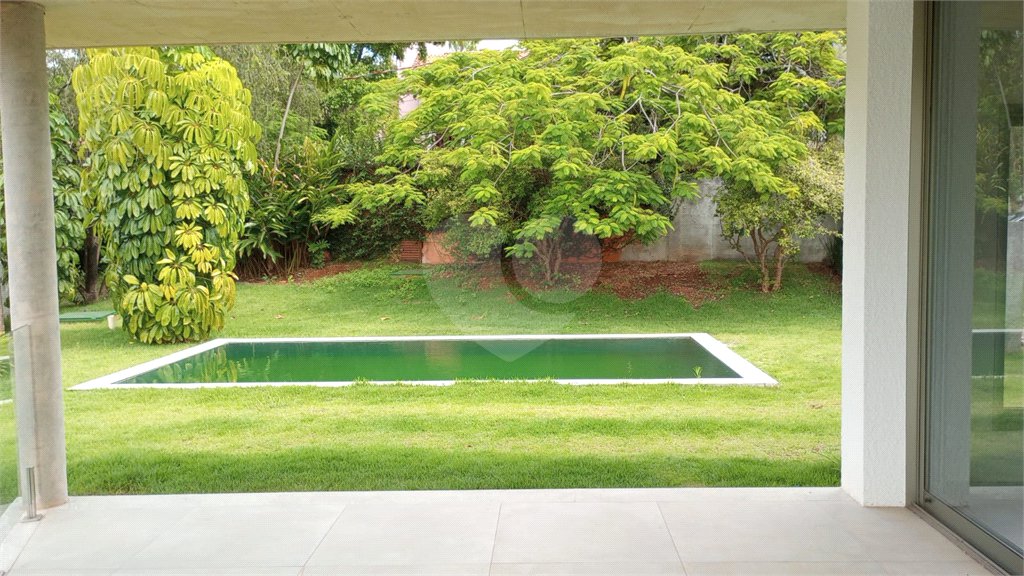 Casa à venda com 4 suítes no condomínio Estância Marambaia, Vinhedo - SP