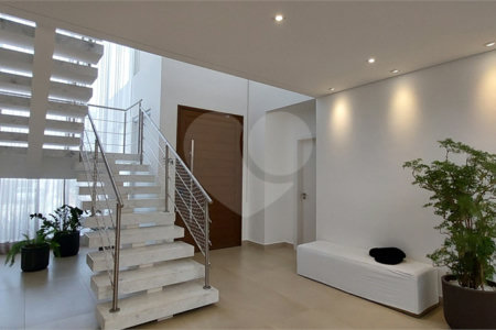 Casa à venda ou para alugar com 4 suítes no condomínio Figueira Garden, Atibaia - SP