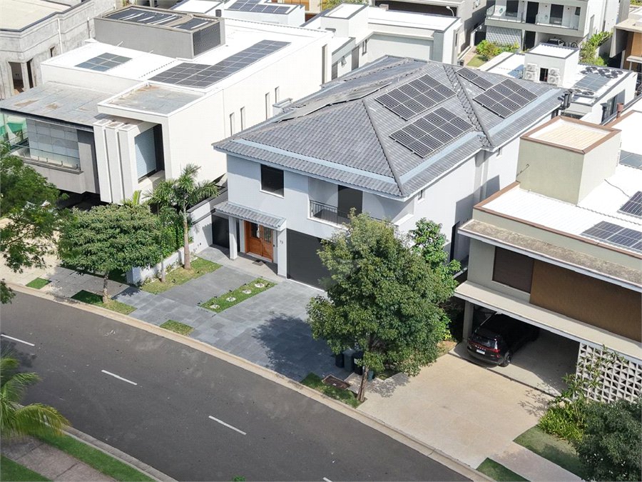 Casa à venda com 4 suítes no condomínio Alphaville Dom Pedro 3, Campinas - SP